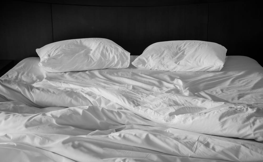 sonhar com cama desarrumada