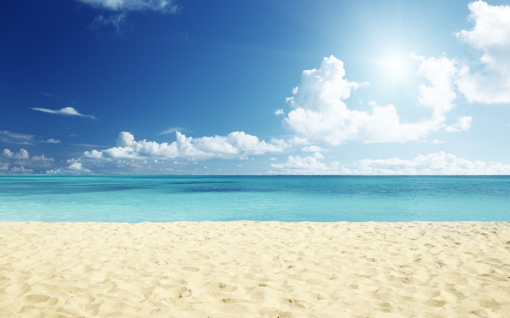 sonhar com areia da praia